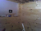 1st floor bedroom side wall combination drywall and wood.