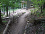 The trail will be bordered with the rocks found around the property.