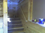 The stairway completed with hand railing installed.